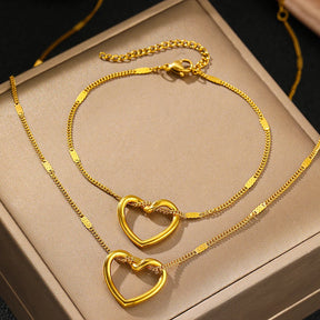 Conjunto de Joias (Colar + Pulseira) Coração Torcido em Aço Inoxidável - Luxo e Sofisticação para Momentos Especiais