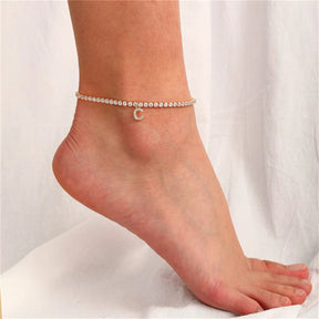 Pulseira de Tornozelo com Inicial de A a Z cor em Ouro com Pedras de Zircônia