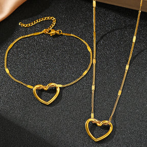 Conjunto de Joias (Colar + Pulseira) Coração Torcido em Aço Inoxidável - Luxo e Sofisticação para Momentos Especiais